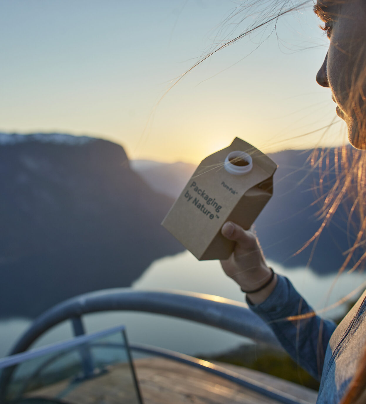 Woman holding a Elopak carton with great view
