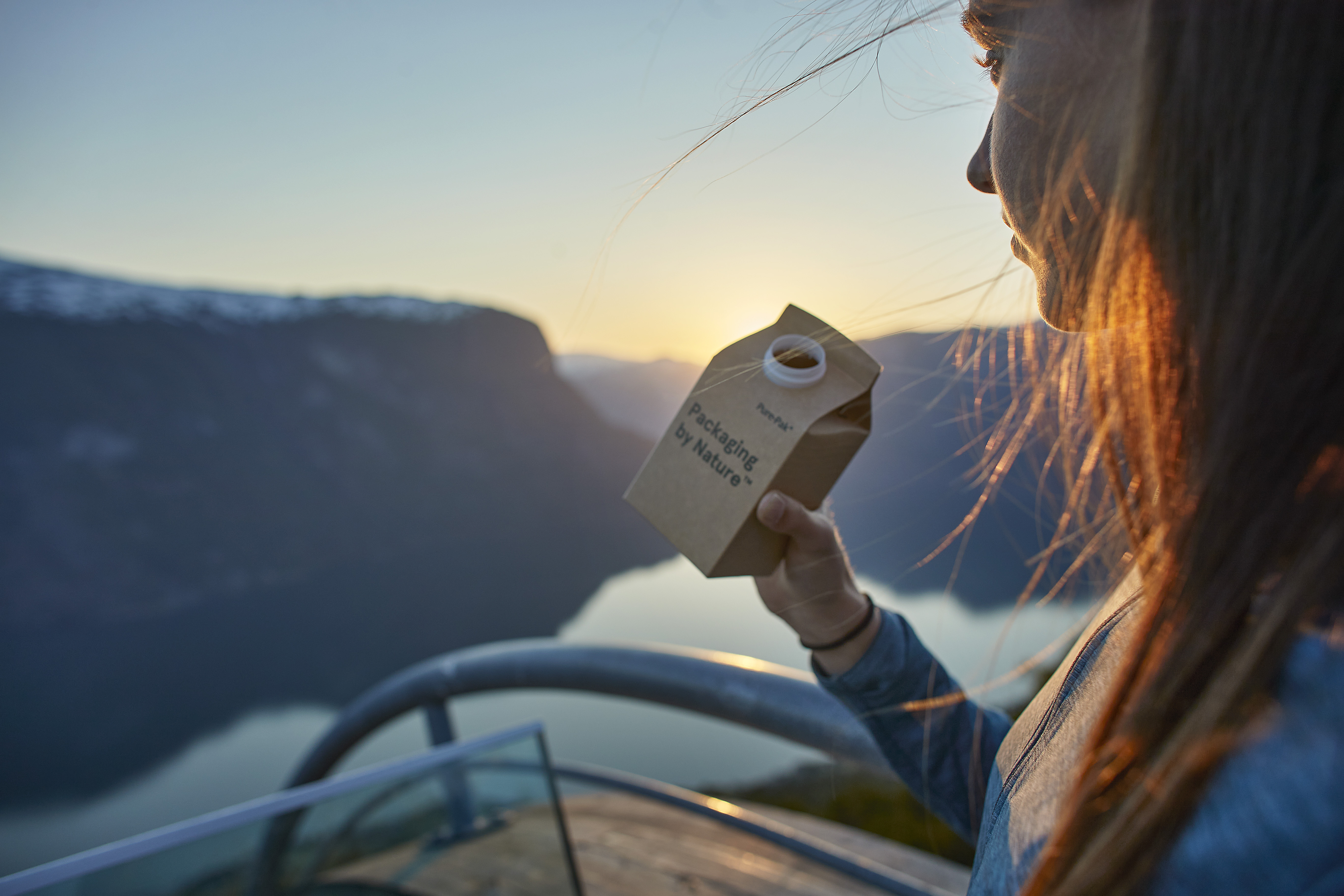 Woman holding a Elopak carton with great view